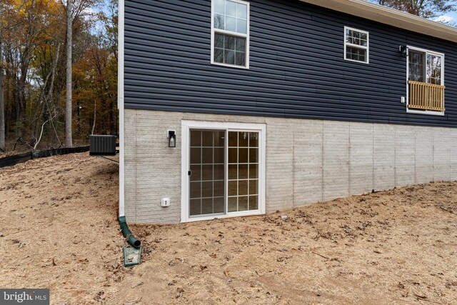 view of home's exterior featuring central air condition unit