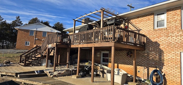 rear view of house with a deck