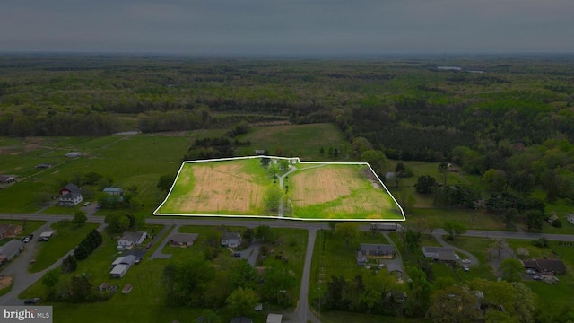 drone / aerial view with a view of trees