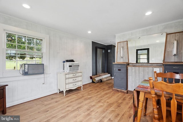 kitchen with recessed lighting, light wood-type flooring, plenty of natural light, and ornamental molding