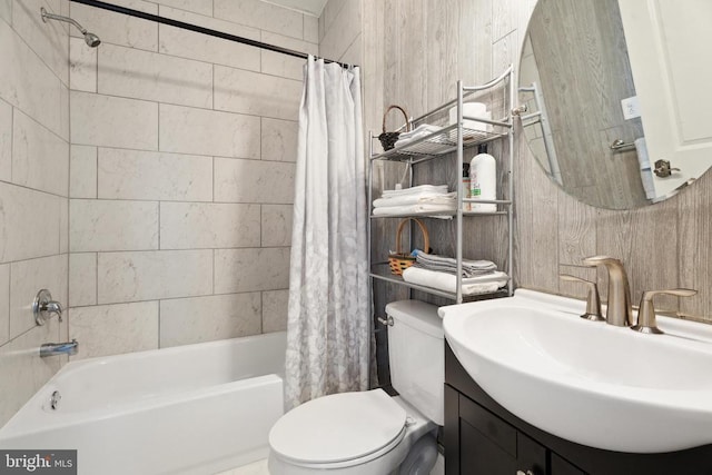 full bath with vanity, toilet, and shower / bathtub combination with curtain