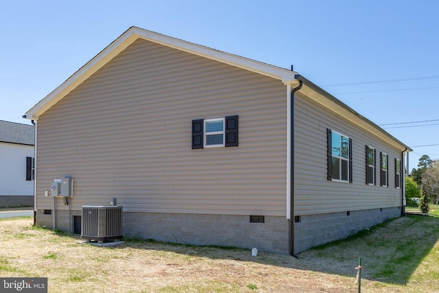 view of home's exterior featuring crawl space and central AC unit