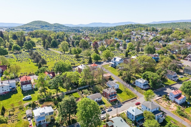 drone / aerial view with a residential view and a mountain view