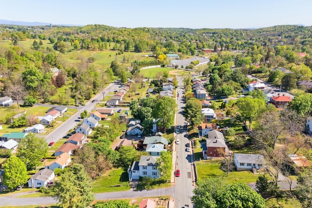 aerial view with a residential view and a wooded view