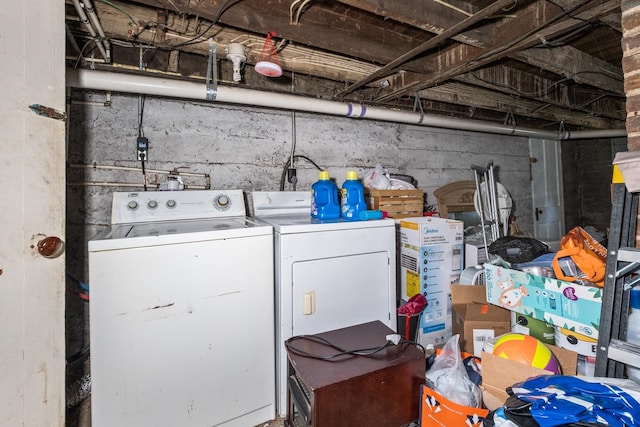 washroom with laundry area and washing machine and clothes dryer