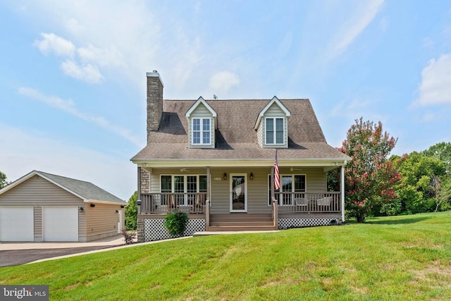 cape cod house featuring a garage, an outdoor structure, a porch, and a front lawn