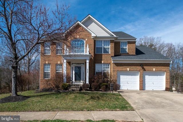 view of front of home featuring brick siding, a front lawn, a garage, a balcony, and driveway