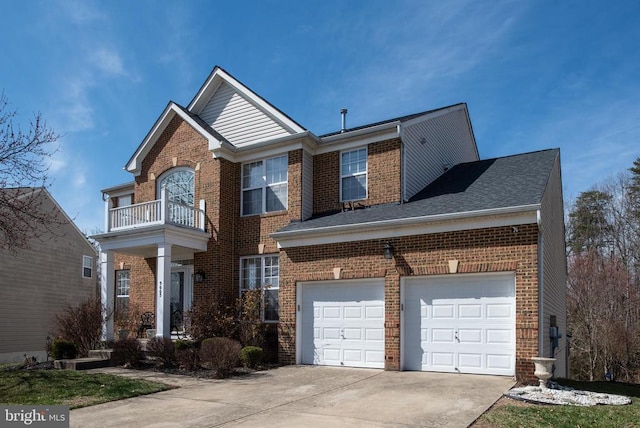 view of front of home featuring a balcony, a garage, brick siding, and driveway