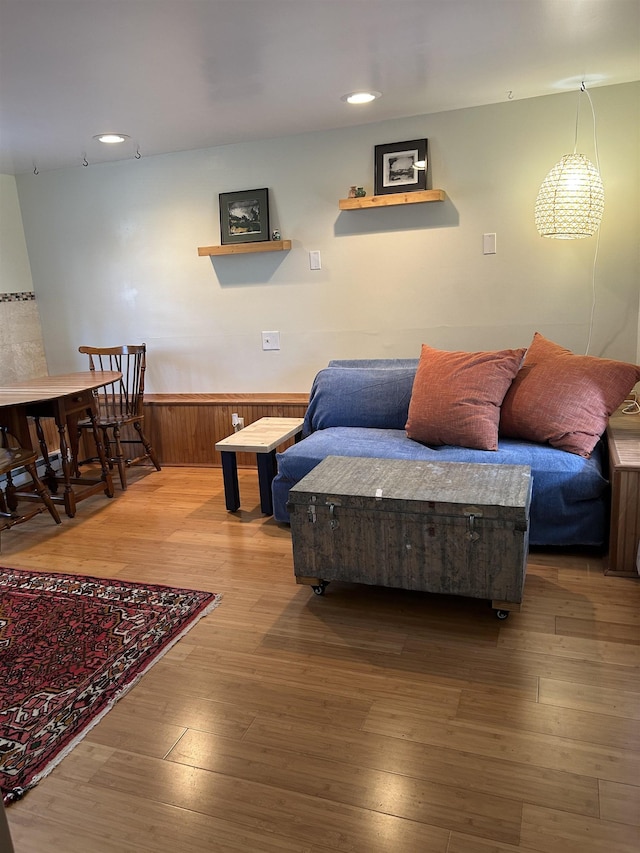 living room with recessed lighting and hardwood / wood-style floors