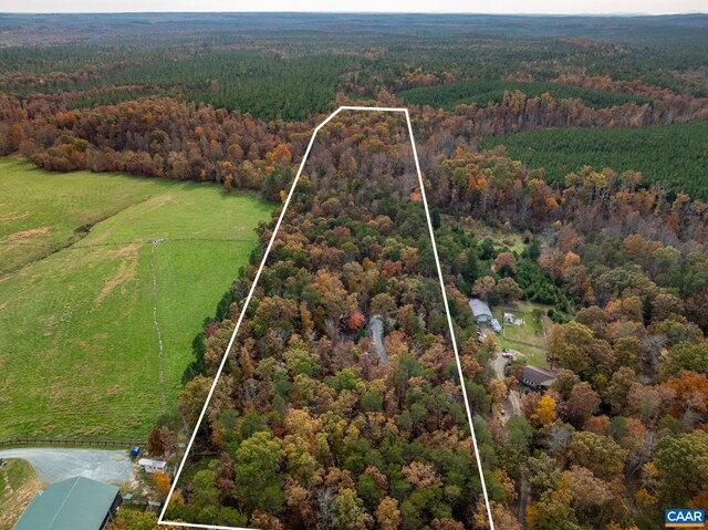 birds eye view of property featuring a rural view