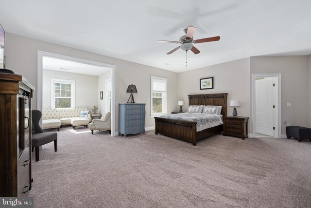 bedroom with light colored carpet and ceiling fan