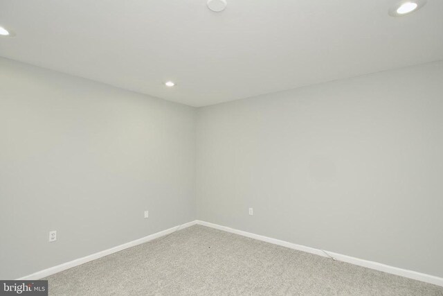 unfurnished room with carpet floors