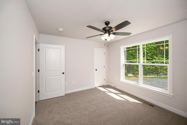 unfurnished bedroom featuring carpet floors