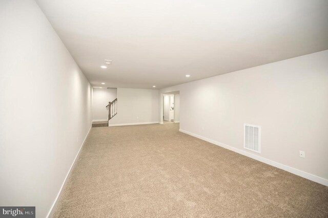 basement with light carpet