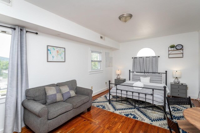 bedroom featuring hardwood / wood-style floors