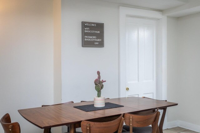dining room featuring light tile patterned flooring