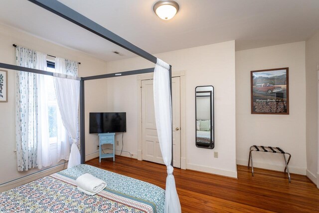 bedroom featuring hardwood / wood-style flooring