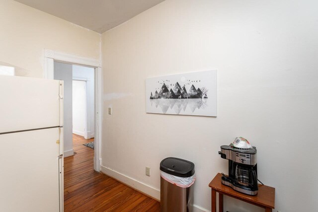 interior space with hardwood / wood-style flooring