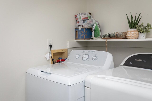 laundry room featuring independent washer and dryer