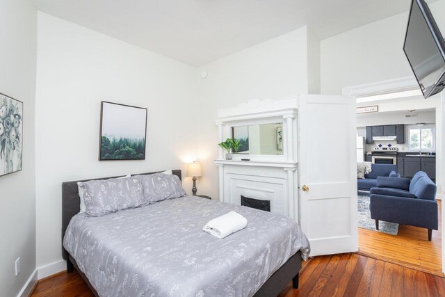 bedroom featuring dark hardwood / wood-style floors