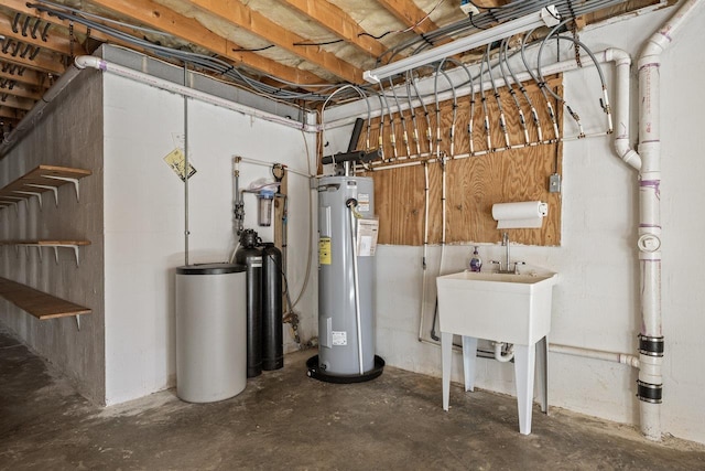 utility room featuring water heater