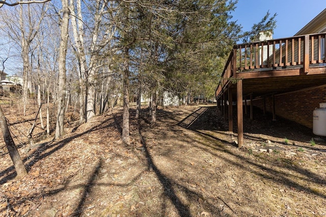 view of yard with a deck