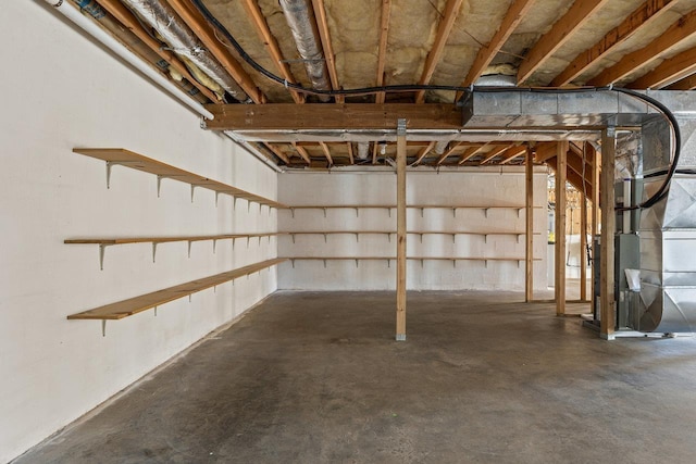 unfinished basement with heating unit