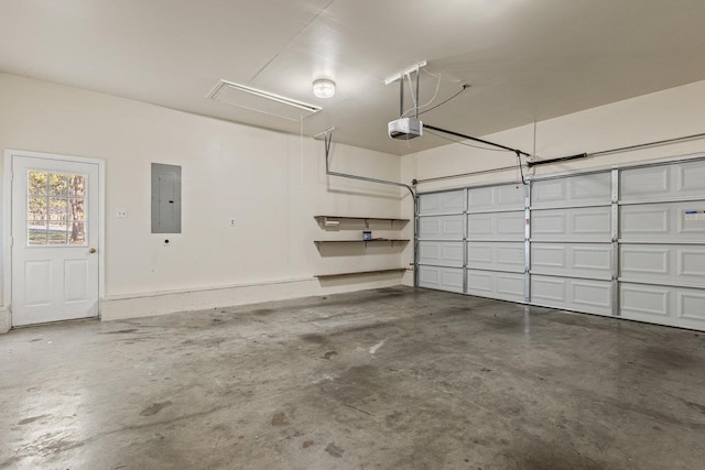 garage with electric panel and a garage door opener