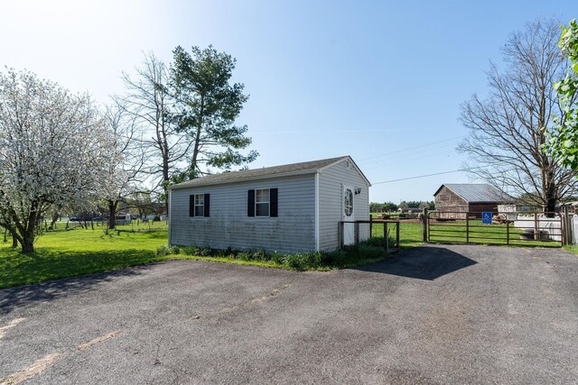 exterior space with a yard