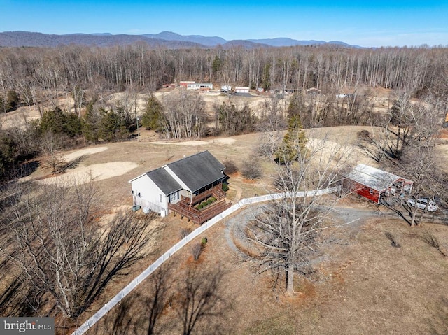 aerial view with a forest view and a mountain view