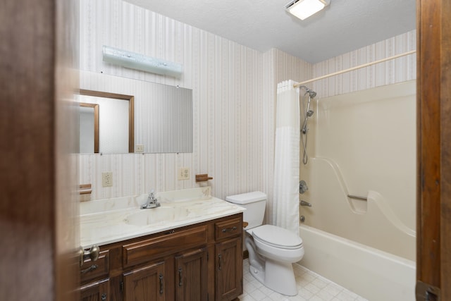 full bathroom featuring shower / bathtub combination, vanity, toilet, and a textured ceiling