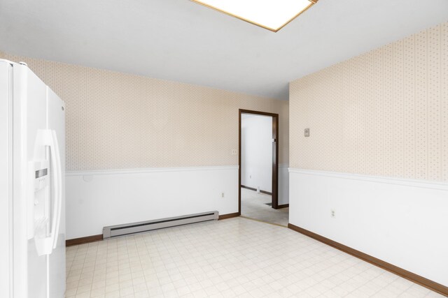 interior space featuring heating unit, wooden walls, and light colored carpet