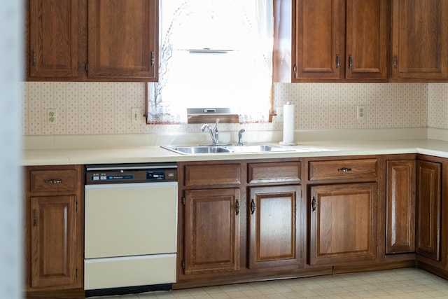 kitchen featuring dishwasher and sink