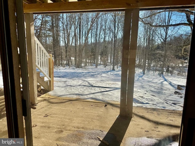 view of yard layered in snow