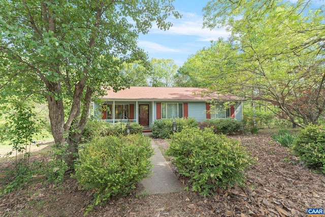 single story home with covered porch