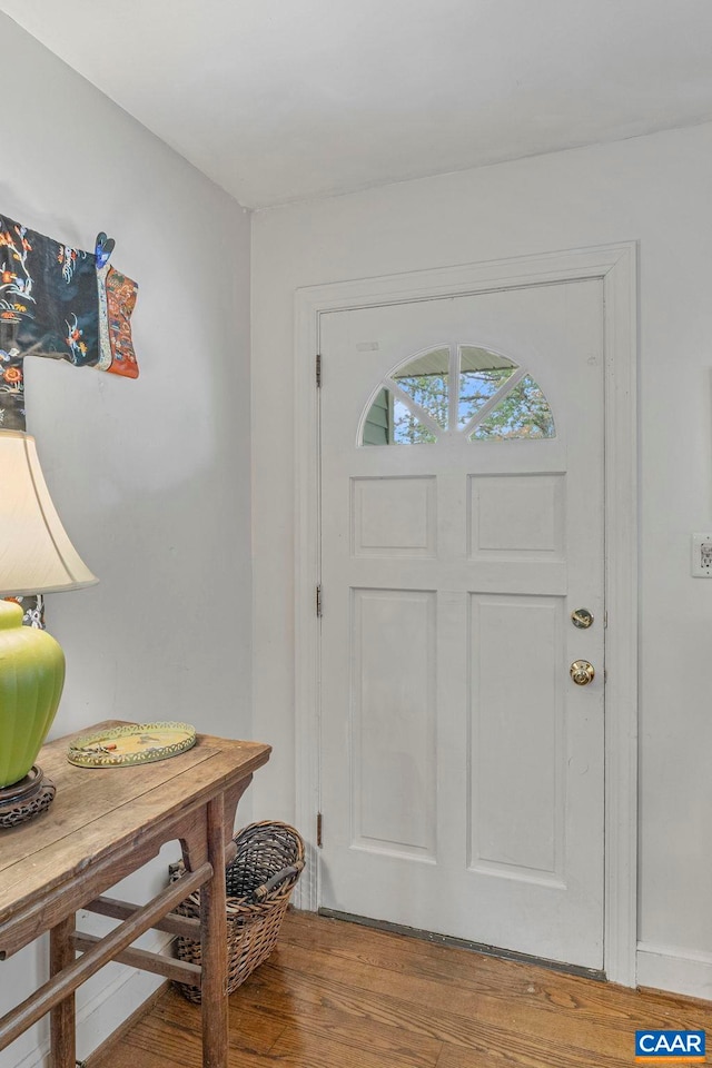 foyer with wood finished floors