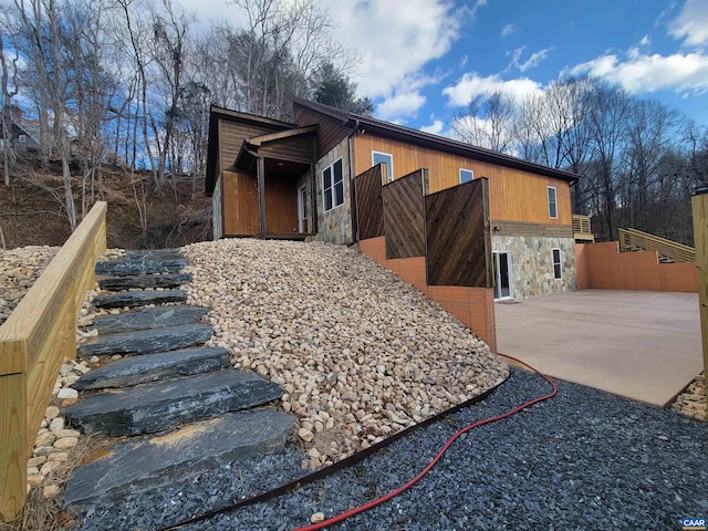 view of home's exterior featuring a patio area