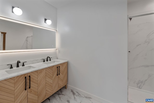 bathroom with vanity and a shower