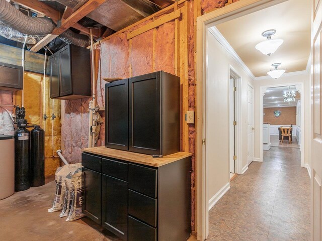 interior space with crown molding