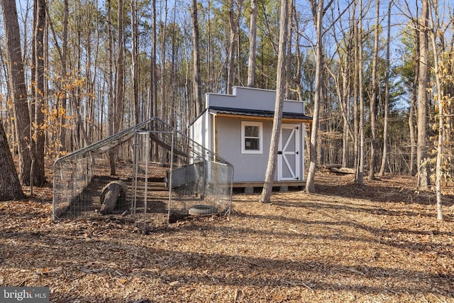 view of shed with stairway