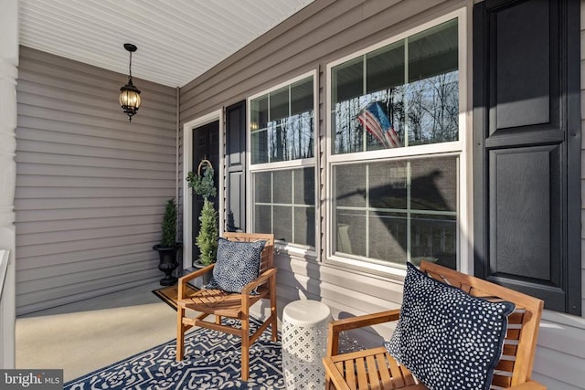 view of patio featuring a porch