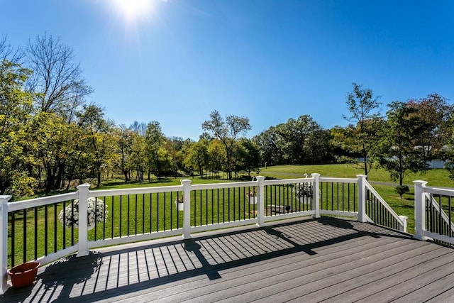 wooden deck with a yard