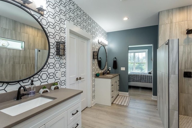 bathroom featuring vanity and wood-type flooring