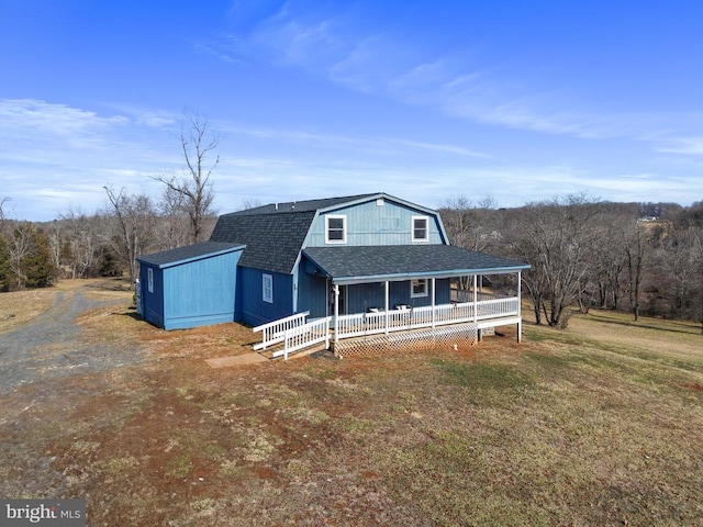 view of front of home featuring a front lawn and a porch