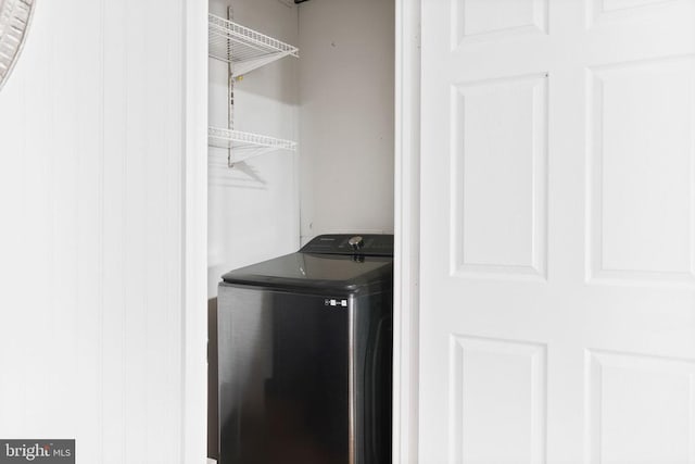 laundry room featuring washer / dryer