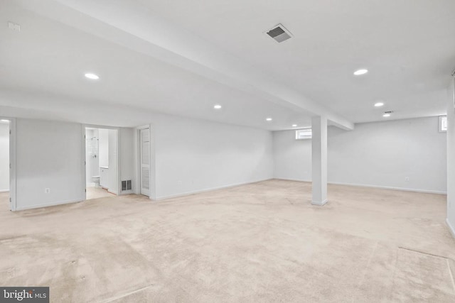 basement featuring recessed lighting, baseboards, visible vents, and carpet flooring