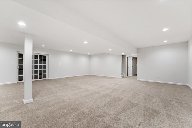 basement with light carpet