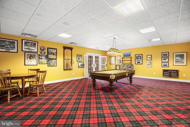 rec room with carpet floors, billiards, and a paneled ceiling