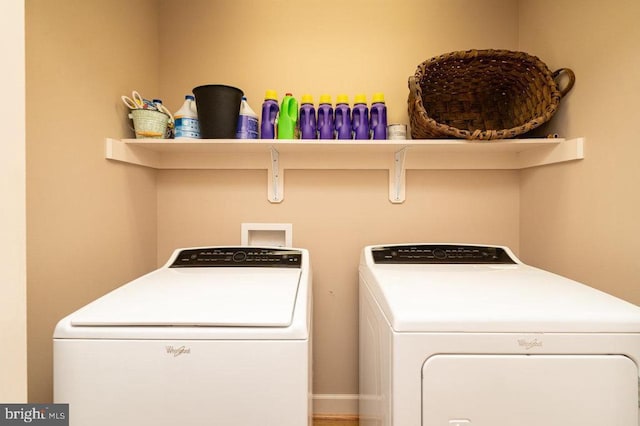 laundry area featuring laundry area and independent washer and dryer