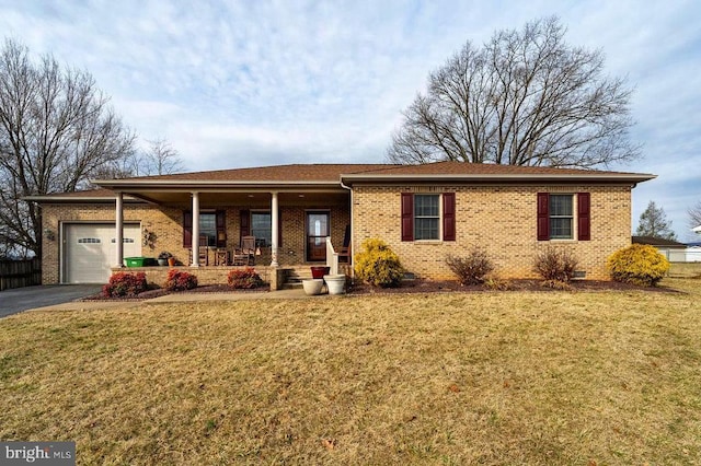 single story home with aphalt driveway, crawl space, a porch, and brick siding